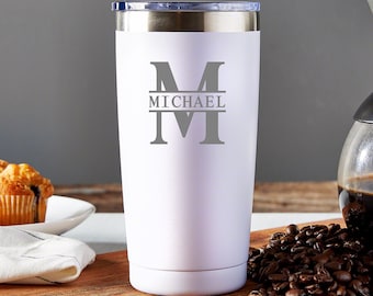May include: White stainless steel travel mug with a gray monogrammed initial "M" and the name "MICHAEL" printed below.