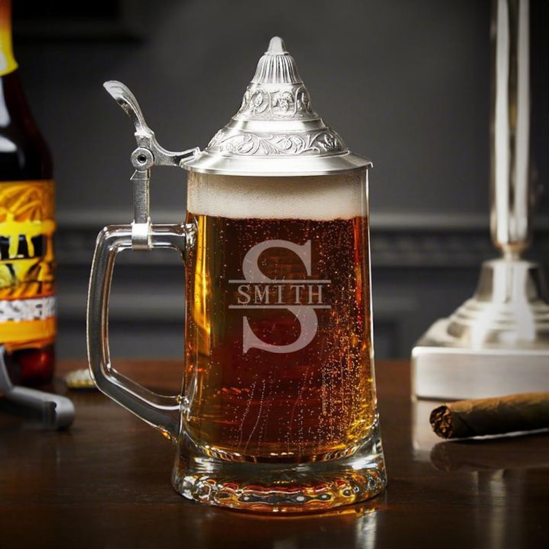 Close-up of engraved German beer stein.