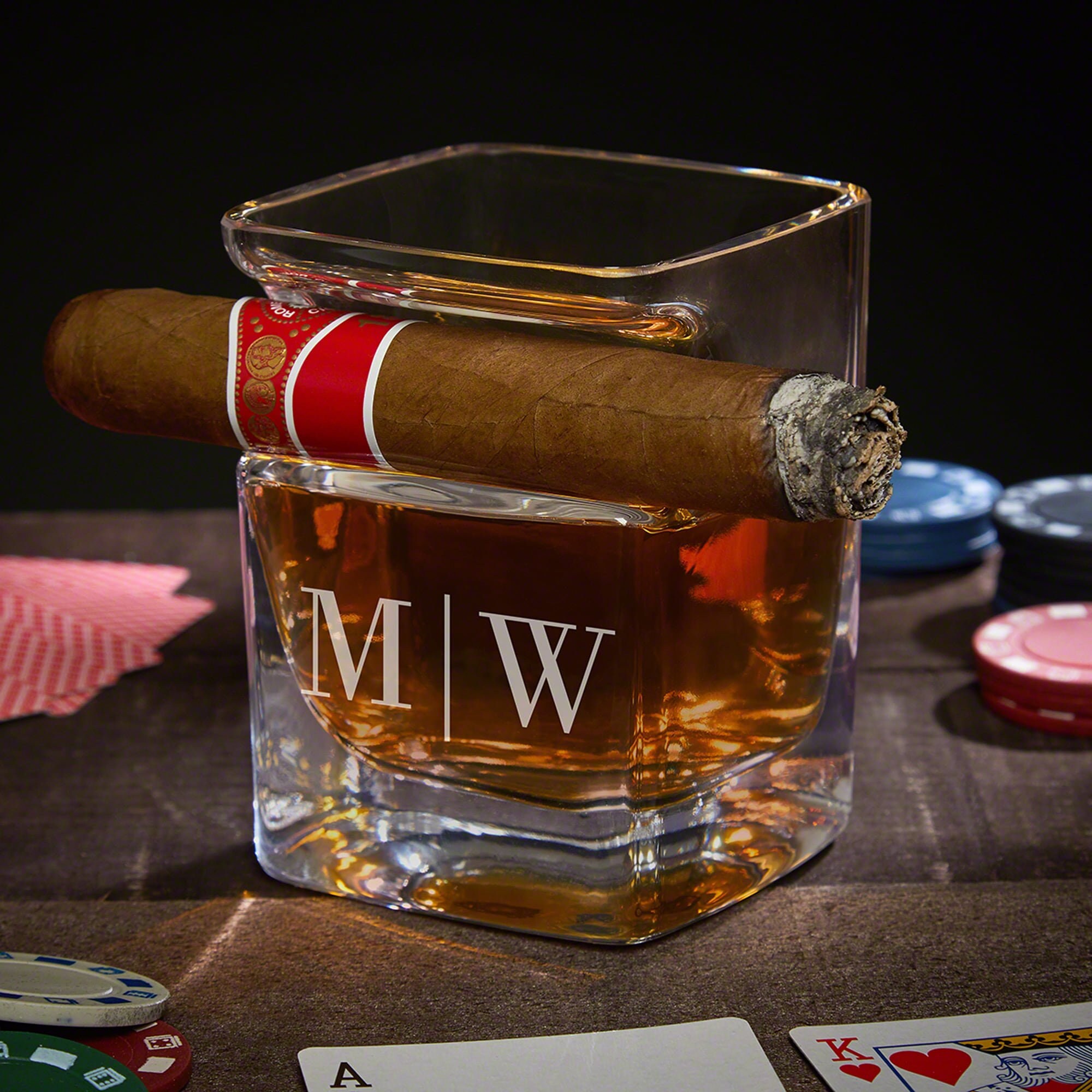 Cigar on glass of whiskey with ice cubes print by Editors Choice