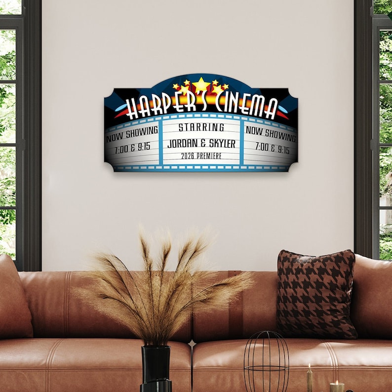 A personalized home theater sign made from birch wood with vivid colors and a natural wood grain finish.
