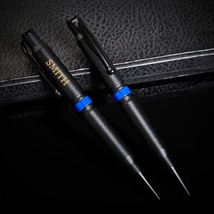 Two custom .308 Bullet Pens with Thin Blue Line design, engraved names.