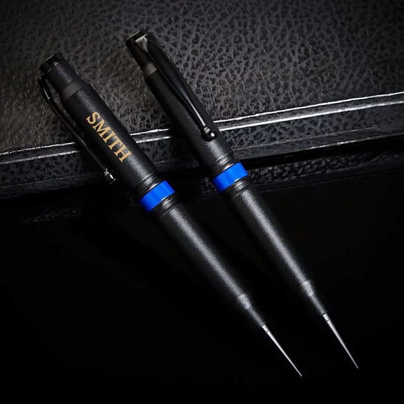 Two custom .308 Bullet Pens with Thin Blue Line design, engraved names.