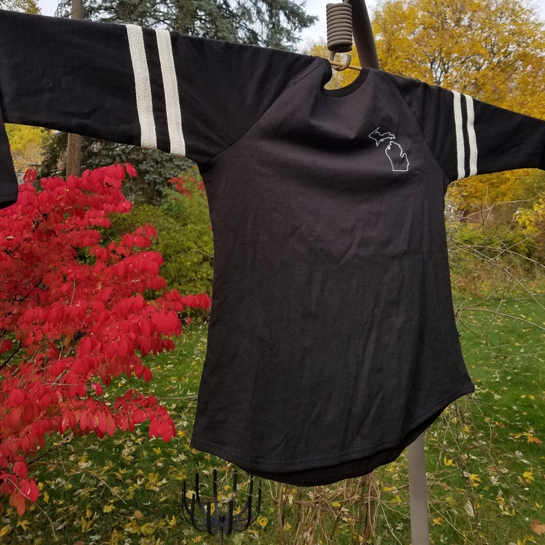 Michigan swag. Michigan ladies style Jersey with glittersparkle striped long sleeve Michigan apparel Michigan outline on front of jersey