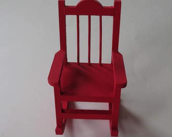 Red plastic 2024 rocking chair