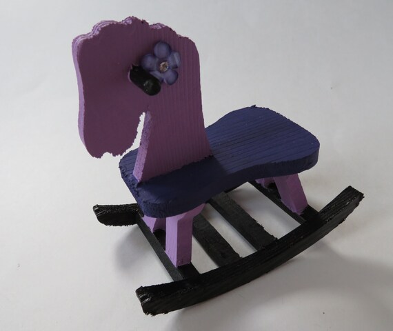 purple rocking horse
