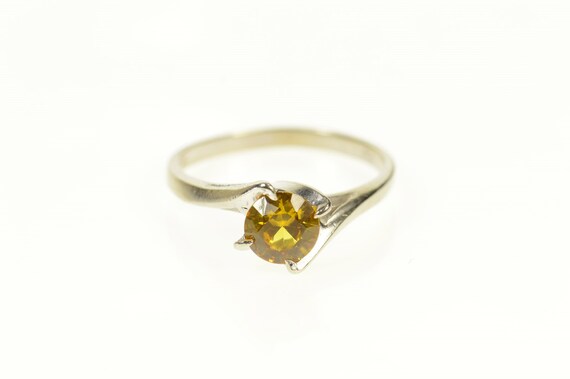 6 x 4 MM 0.31 Carat ctw 10k Gold Oval Yellow Citrine and Diamond Bypass Swirl Cocktail Anniversary Fashion Ring 6 x 4 MM 0.31 Carat ctw 10k Gold Oval Yellow Citrine and Diamond Bypass Swirl Cocktail Anniversary Fashion Ring