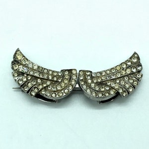 Oude systeembroche in massief zilver en Art Deco reversclip met strass
