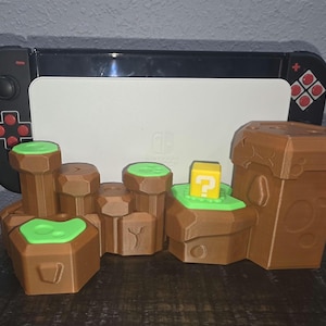 Super Mario Bros. Level Up! Switch & OLED Docking Station with Hidden Game Storage