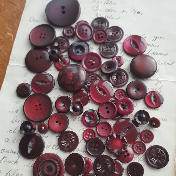 55 lovingly selected purple and dark red plastic vintage buttons dating back to the 1930s