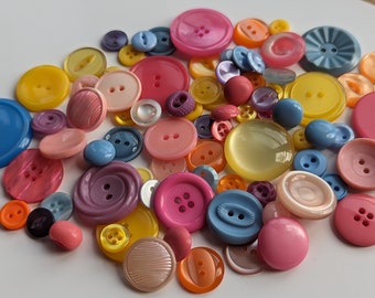 Lovingly selected collection of vintage plastic buttons in bright bold colours. 75 vintage buttons dating back to the 1950s and 60s