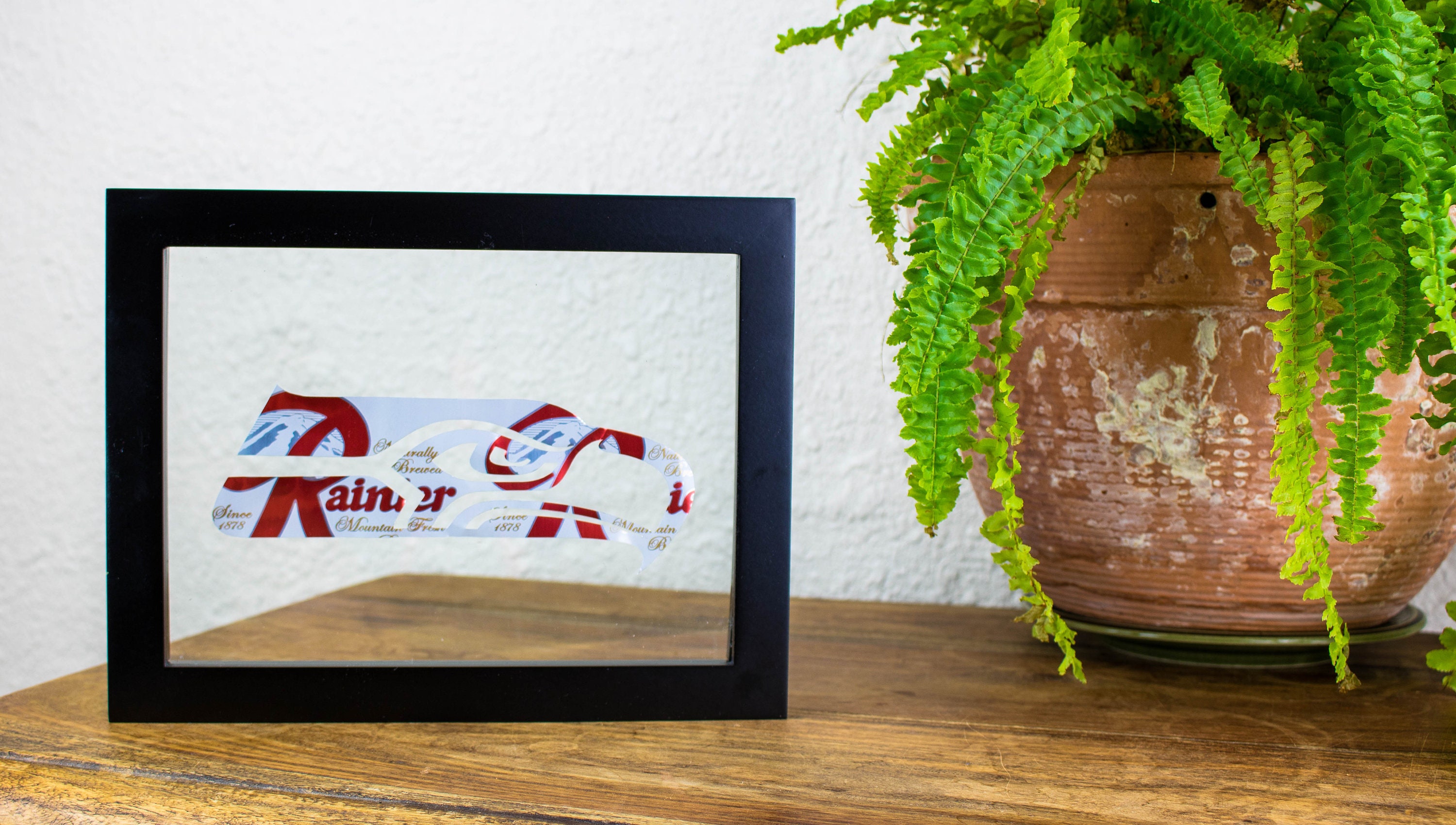 Seattle Seahawks NFL Logo Cut Into a Rainier Beer Can