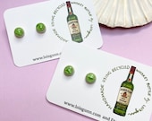 Stud earrings made with JAMESON recycled WHISKEY bottle glass and sterling silver posts. WHISKY earrings by Lois Gunn