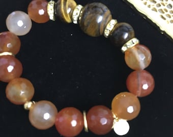 Carnelian beaded bracelet with tiger eye beads and crystal spacers