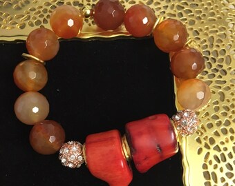 Carnelian beaded bracelet with large coral chunks, gold spacers and crystal pave accent beads