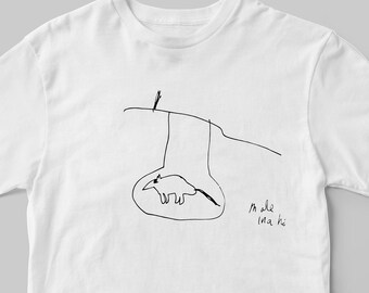 May include: A white short-sleeved t-shirt featuring a black line drawing of an animal inside a circular enclosure hanging from a horizontal line. The text "Mole sea to" is written in black ink below the drawing on the front of the garment.