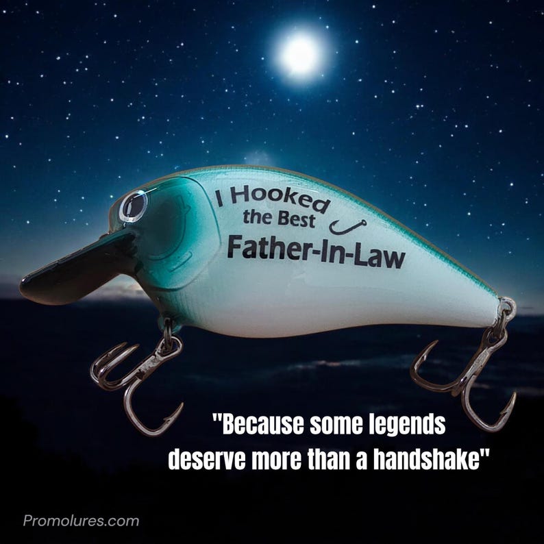 a fishing lure with a humorous message about being the best father in law, set against a starry night sky.