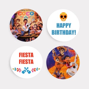 May include: Four round stickers featuring characters and scenes from the Disney Pixar film Coco. One sticker shows the main character Miguel playing a guitar with his family in the background. Another sticker shows a skull with the text "Happy Birthday!" in blue. The third sticker shows Miguel and his skeleton friend playing guitars. The last sticker has the text "Fiesta Fiesta" in red with a guitar and floral design.