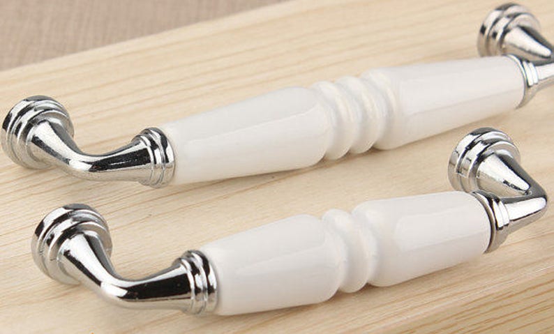 ручка керамическая белая. хисгульт ручка, фарфор белый. модные ручки для кухонной мебели. дверные ручки knob с керамикой. ручка скоба new deco.