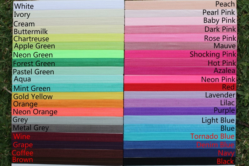 May include: A color chart showing 28 different colors of elastic hair ties. The colors are arranged in two columns. The left column includes colors like white, ivory, cream, buttermilk, chartreuse, apple green, neon green, forest green, pastel green, aqua, mint green, gold yellow, orange, neon orange, grey, metal grey, wine, grape, coffee, and brown. The right column includes colors like peach, pearl pink, baby pink, dark pink, rose pink, mauve, shocking pink, hot pink, azalea, neon pink, red, lavender, lilac, purple, light blue, blue, tornado blue, denim blue, navy, and black.