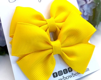 Yellow ribbon hair bows, yellow hair clips, yellow bow bobbles, yellow hair accessories, yellow school bows. 2 and a half inch tux bows,