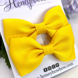 Yellow ribbon hair bows, yellow hair clips, yellow bow bobbles, yellow hair accessories, yellow school bows. 3 inch hair bows,