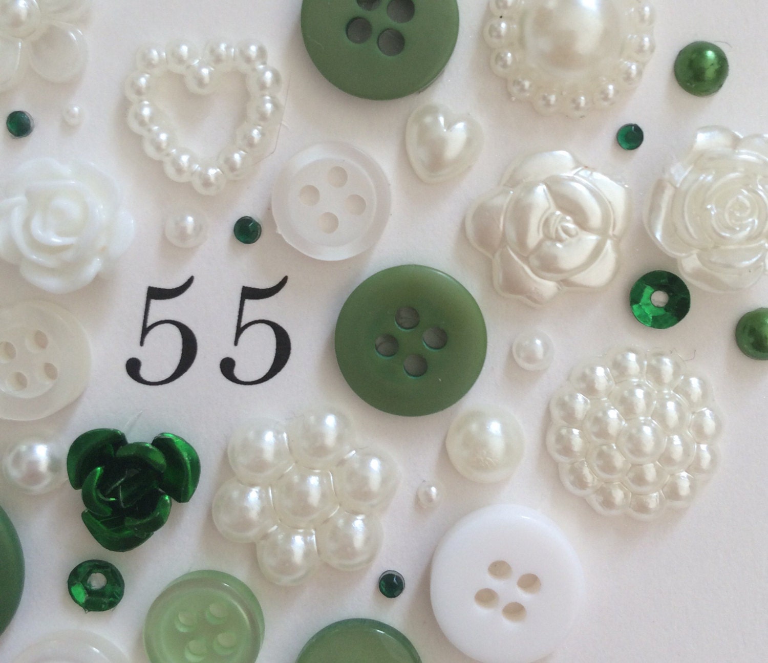 A beautifully designed emerald-themed anniversary card with a shimmering green hue, perfect for a 55th celebration.