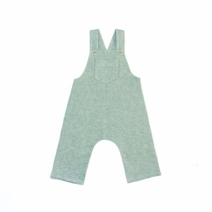 May include: A light green pair of overalls with a single pocket on the front.