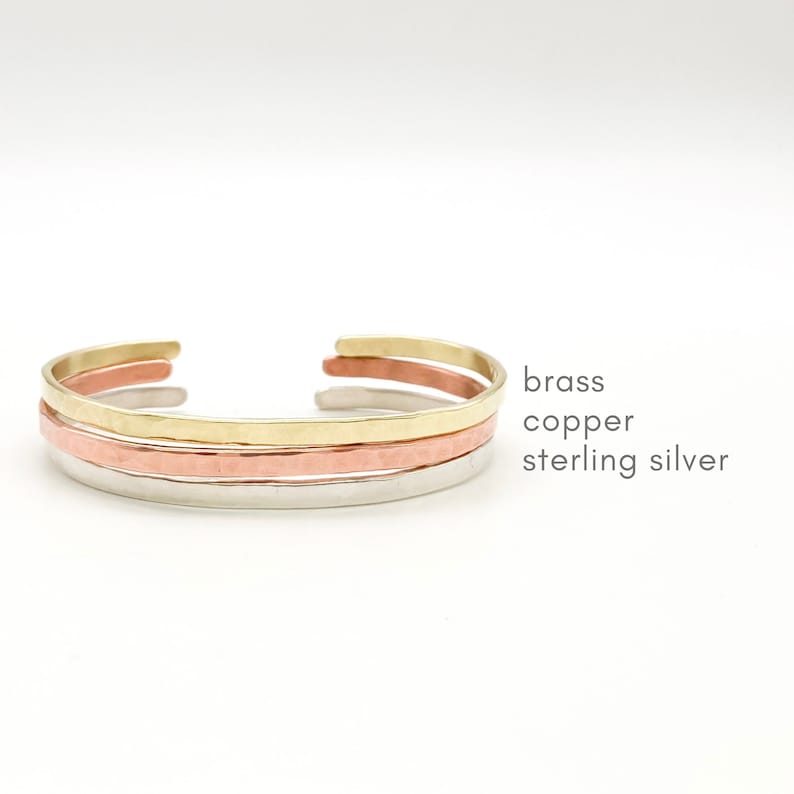 Thin stacking cuff bracelet can be made in gold toned brass, rose toned copper, or sterling silver. They have a light hammered finish for an artisan or handmade look