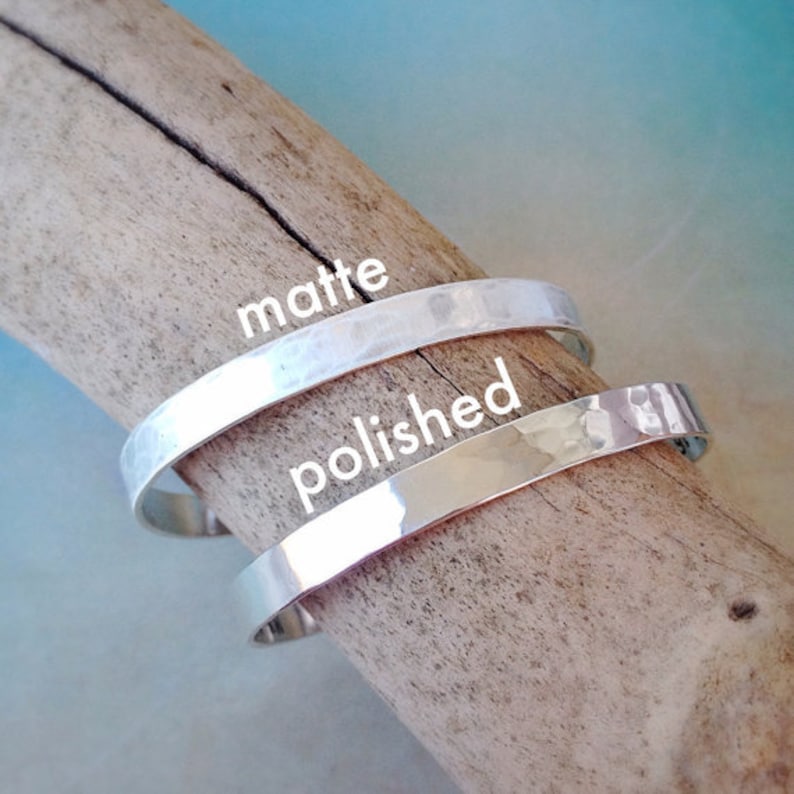 Outside finish can be polished or matte. Polished looks shiny and mirrored, while matte looks flat and lighter in color. Bracelets are lightly hammered for a handmade or artisan look.
