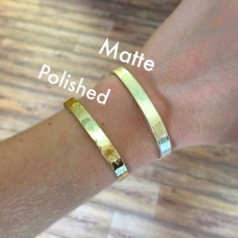 Outside finish can be polished or matte. Polished looks shiny and mirrored, while matte looks flat and lighter in color. Bracelets are lightly hammered for a handmade or artisan look.