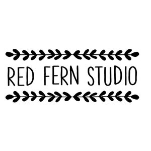 May include: A black and white logo for Red Fern Studio. The text "RED FERN STUDIO" is centered, with decorative leaf borders above and below. The design is simple and elegant, suitable for branding.