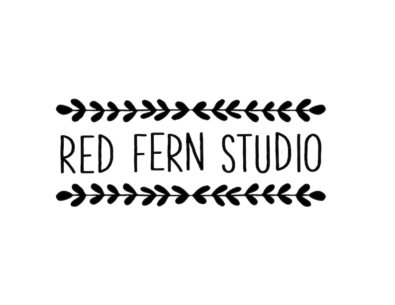 May include: A black and white logo for Red Fern Studio. The text "RED FERN STUDIO" is centered, with decorative leaf borders above and below. The design is simple and elegant, suitable for branding.