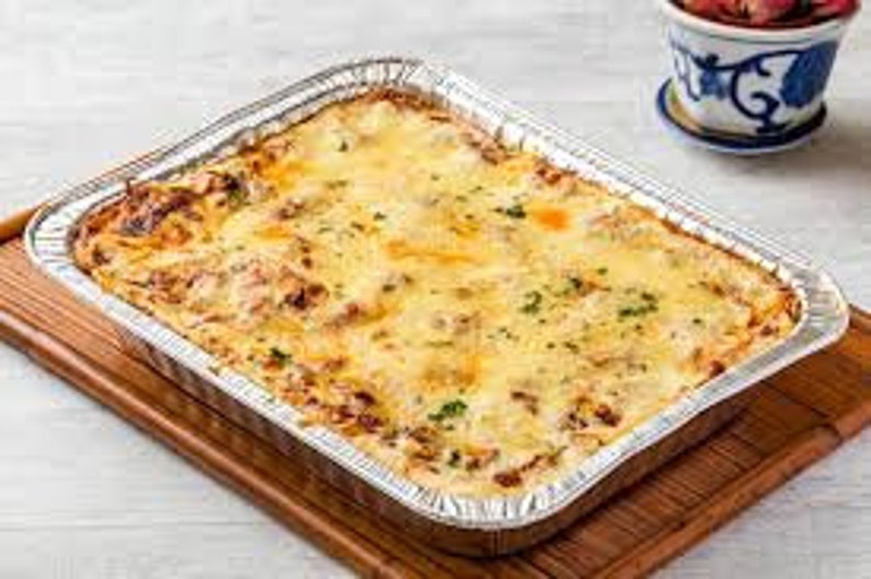 Homemade Lasagna Consists of 3 Cheeses, Ground Beef, Pasta and Many