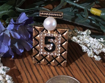 Botella de perfume dorada, negra y transparente (5 unidades) con perla artificial