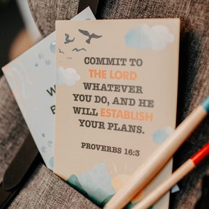 May include: A motivational quote card with a blue, green, and orange watercolor background. The quote reads "Commit to the Lord whatever you do, and he will establish your plans." The verse is Proverbs 16:3.