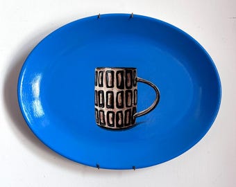 Brown Mug with Picasso Blue. Painting on a Plate Collection. 28cm x 22cm