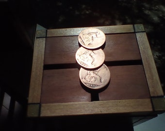 The 3 penny box...  Antique British pennies