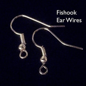 May include: A close-up view of different earring findings, including earring posts, leverbacks, fishhook ear wires, clip-ons, and kidney wires.