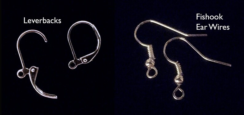 May include: Two pairs of earring findings, one pair of leverback closures and one pair of fishhook ear wires. Both pairs are silver in color.