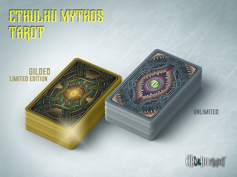 May include: Two decks of Cthulhu Mythos Tarot cards. The deck on the left is a gilded limited edition with gold edges. The deck on the right is an unlimited edition with silver edges. Both decks feature a detailed illustration of a tentacled creature with an eye on the back of the cards.