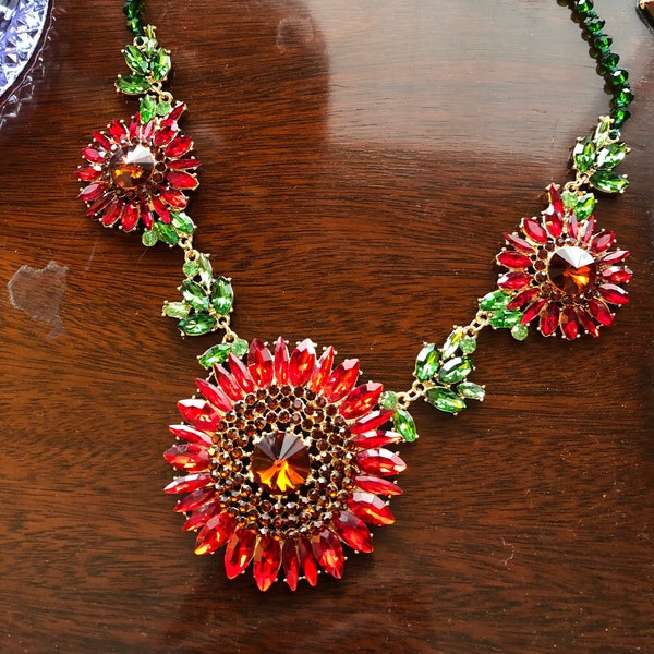 Amazing statement necklace with three large bright red rhinestone flowers
