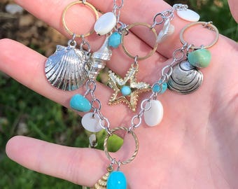 Necklace and earrings set featuring seashore charms, Chico's, with tags attached