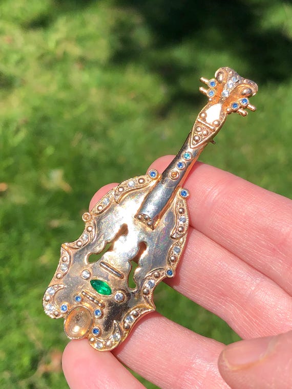 1940s pot metal mandolin brooch, some missing rhinestones!