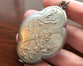 Antique holly sliding locket with mirror, art nouveau era, Christmas locket