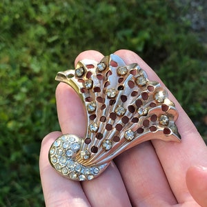 Signed Karu retro era rhinestone brooch or pendant