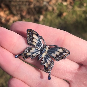 Signed Monet rhinestone and enamel butterfly brooch