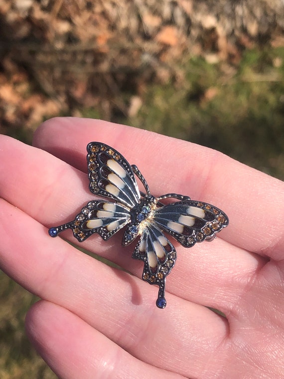 Signed Monet rhinestone and enamel butterfly brooc