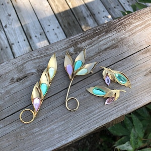 Set of two large leaf brooches and clip on earrings with reflective pastel rhinestones. Striking!