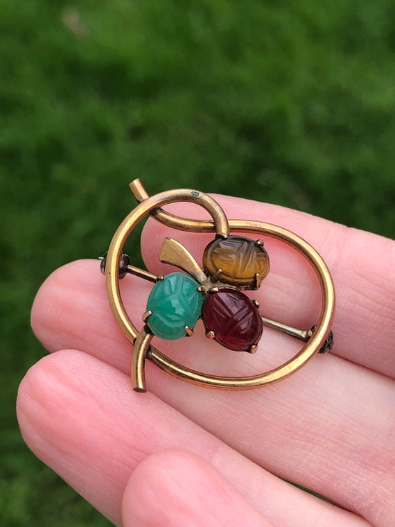 Vintage gemstone scarab brooch in shape of shamroc