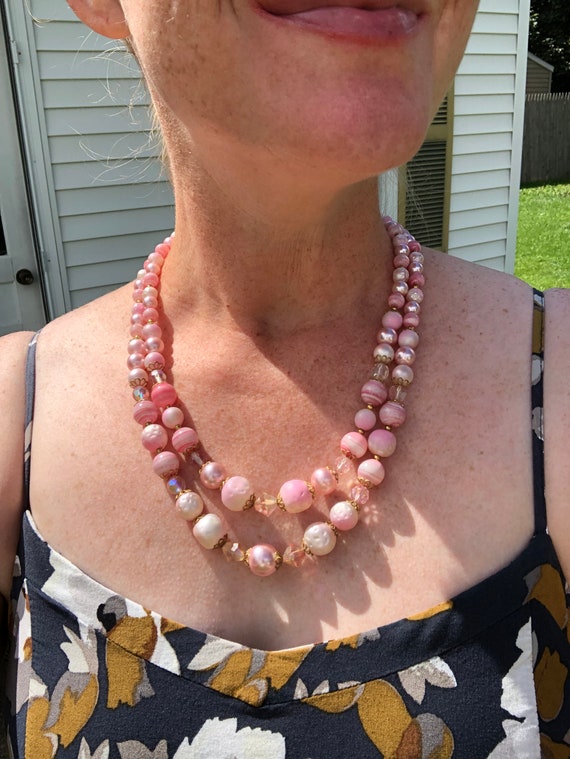 Double strand 1960s pink beaded necklace with lots